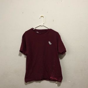Tee shirt with praying hand on front